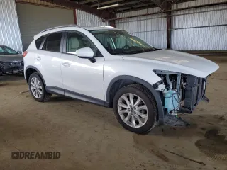 2014 Mazda CX-5 Grand Touring with VIN JM3KE2DY5E0383597, listed as a Copart auction lot 50205545 with 110,052 mi miles and Salvage Title. Bid and sale history available at carsss.com. Image 4.