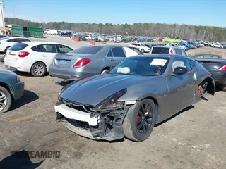 2009 Nissan 370Z Touring z VIN JN1AZ44E19M402223, wystawiony jako IAAI lot #41715048 z przebiegiem 89 123 mil mil oraz . Historia ofert i sprzedaży dostępna na DreamBid. Obrazek 2.