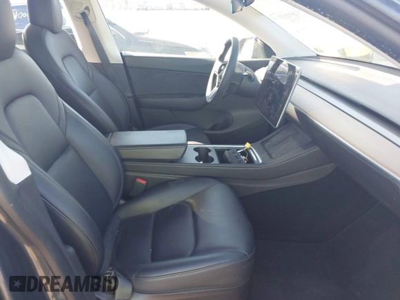 2022 Tesla Model Y Performance with VIN 7SAYGDEF9NF326944, listed as a IAAI auction lot 42111633 with Not Provided miles and . Bid and sale history available at DreamBid. Image 5.