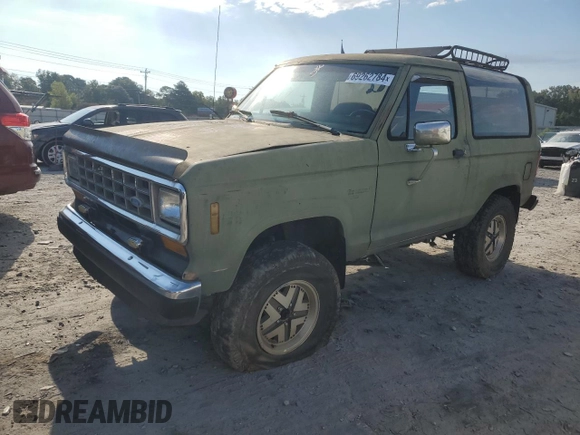 1987 Ford Bronco z VIN 1FMCU14T6HUC98971, wystawiony jako Copart lot #69262784 z przebiegiem 49 522 mil mil oraz Czysty tytuł • Clean title. Historia ofert i sprzedaży dostępna na DreamBid. Obrazek 1.