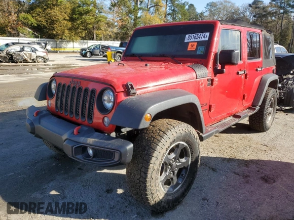 2018 Jeep Wrangler JK Unlimited Sport S with VIN 1C4BJWDG2JL899265, listed as a Copart auction lot 85165474 with 102,619 mi miles and Salvage Title. Bid and sale history available at carsss.com. Image 1.
