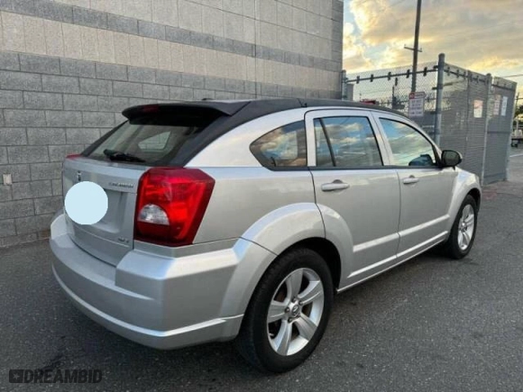 2010 Dodge Caliber SXT with VIN 1B3CB4HA1AD579409, listed as a Copart auction lot 49857695 with 100,311 mi miles and Clean Title. Bid and sale history available at carsss.com. Image 4.