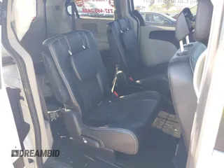 2019 Dodge Grand Caravan SXT with VIN 2C4RDGCG1KR545775, listed as a IAAI auction lot 42061287 with 131,603 mi miles and . Bid and sale history available at DreamBid. Image 8.