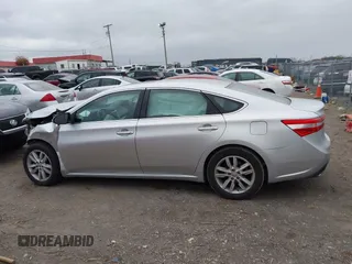 2014 Toyota Avalon Limited with VIN 4T1BK1EB8EU133085, listed as a IAAI auction lot 40949898 with 126,697 mi miles. Bid and sale history available at carsss.com. Image 13.