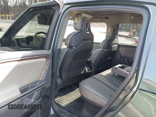 2022 Rivian R1T Adventure z VIN 7FCTGAAA8NN015369, wystawiony jako IAAI lot #41407842 z przebiegiem 22 507 mil mil oraz . Historia ofert i sprzedaży dostępna na DreamBid. Obrazek 8.