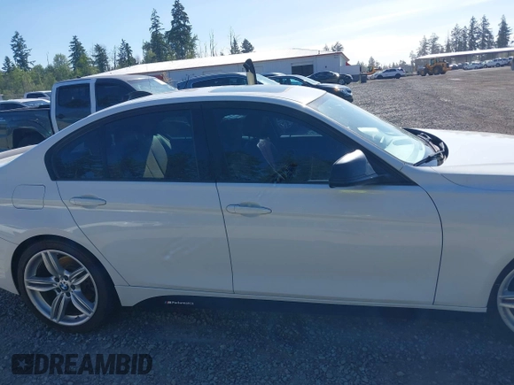 2013 BMW 3 Series 335i with VIN WBA3A9G5XDNP36238, listed as a IAAI auction lot 42347821 with 97,227 mi miles and . Bid and sale history available at DreamBid. Image 14.