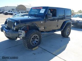 2018 Jeep Wrangler JK Unlimited Sahara with VIN 1C4HJWEG3JL927910, listed as a IAAI auction lot 41808193 with 59,568 mi miles. Bid and sale history available at carsss.com. Image 17.