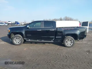 2015 GMC Canyon 4WD SLT with VIN 1GTG6CE34F1153369, listed as a IAAI auction lot 41277810 with 135,821 mi miles. Bid and sale history available at carsss.com. Image 14.