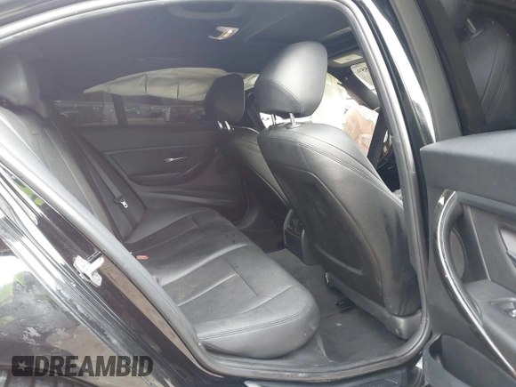 2016 BMW 3 Series 320i with VIN WBA8E1G51GNU11798, listed as a IAAI auction lot 41582559 with 105,866 mi miles and . Bid and sale history available at carsss.com. Image 8.