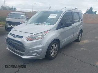 2016 Ford Transit Connect XLT with VIN NM0AE8F78G1230587, listed as a IAAI auction lot 41643706 with 98,957 mi miles and . Bid and sale history available at DreamBid. Image 2.