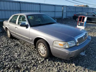 2006 Mercury Grand Marquis LS Premium with VIN 2MEFM75W76X619059, listed as a Copart auction lot 66880594 with 111,387 mi miles and Salvage Title. Bid and sale history available at carsss.com. Image 4.