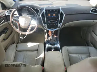 2014 Cadillac SRX Premium Collection z VIN 3GYFNGE32ES573872, wystawiony jako Copart lot #49871955 z przebiegiem 119 362 mil mil oraz Szkody całkowita. Historia ofert i sprzedaży dostępna na DreamBid. Obrazek 8.