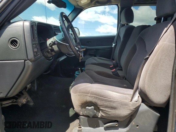 2002 GMC Sierra 1500 SLE with VIN 2GTEK19T621378897, listed as a Copart auction lot 60898315 with 137,509 mi miles and Salvage title. Bid and sale history available at DreamBid. Image 7.