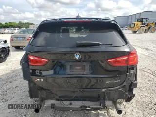 2019 BMW X1 xDrive28i with VIN WBXHT3C59K5L36435, listed as a Copart auction lot 60189985 with 105,110 mi miles and Salvage title. Bid and sale history available at DreamBid. Image 6.