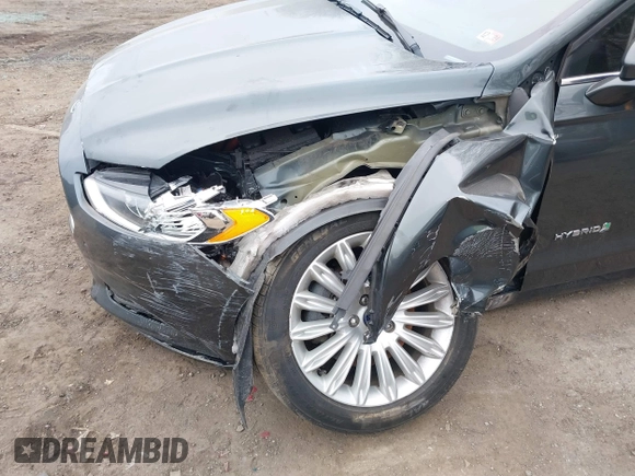 2015 Ford Fusion SE Hybrid with VIN 3FA6P0LU0FR242452, listed as a IAAI auction lot 41790218 with 163,741 mi miles. Bid and sale history available at carsss.com. Image 6.