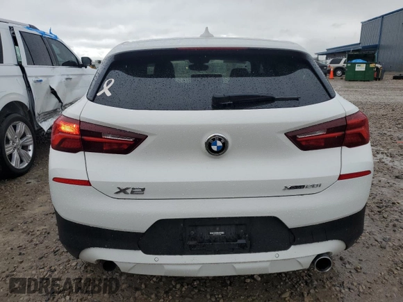 2022 BMW X2 xDrive28i z VIN WBXYJ1C00N5U17584, wystawiony jako Copart lot #55994955 z przebiegiem 21 973 mil mil oraz Czysty tytuł • Clean title. Historia ofert i sprzedaży dostępna na DreamBid. Obrazek 6.