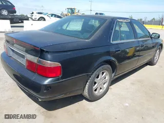 1998 Cadillac Seville Touring STS with VIN 1G6KY5499WU916185, listed as a IAAI auction lot 42035783 with 164,763 mi miles. Bid and sale history available at carsss.com. Image 4.
