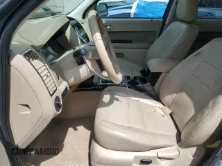 2012 Ford Escape Limited z VIN 1FMCU0EG9CKA20453, wystawiony jako Copart lot #56009755 z przebiegiem 190 000 mil mil oraz Szkoda całkowita • Salvage title. Historia ofert i sprzedaży dostępna na DreamBid. Obrazek 7.
