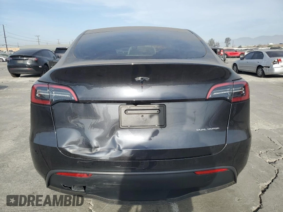 2024 Tesla Model Y Long Range with VIN 7SAYGDEE8RF089456, listed as a Copart auction lot 85521934 with 13,837 mi miles and Salvage title. Bid and sale history available at DreamBid. Image 6.