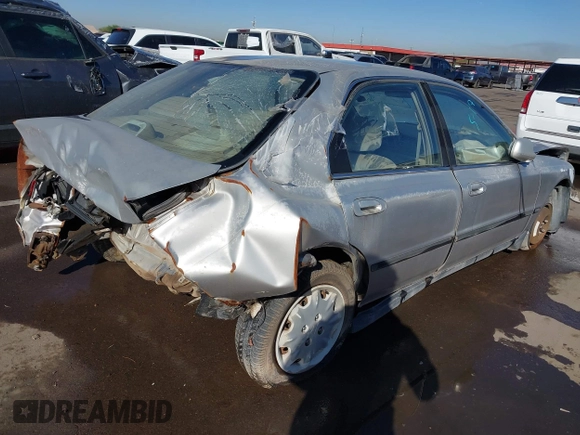 1997 Honda Accord LX with VIN 1HGCD5637VA249818, listed as a IAAI auction lot 40947015 with 170,153 mi miles and . Bid and sale history available at carsss.com. Image 4.