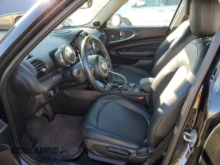 2017 MINI Clubman Cooper with VIN WMWLN5C53H2E32391, listed as a Copart auction lot 77231654 with 105,842 mi miles and Salvage Title. Bid and sale history available at carsss.com. Image 7.