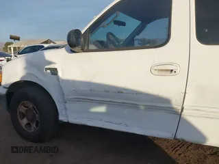 2003 Ford F-150 XL with VIN 2FTRX17L13CB04616, listed as a IAAI auction lot 41114369 with Not provided miles and . Bid and sale history available at DreamBid. Image 6.