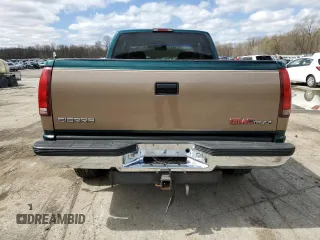 1995 GMC Sierra 1500 z VIN 2GTEK19K3S1511767, wystawiony jako Copart lot #51977295 z przebiegiem 215 667 mil mil oraz Szkody całkowita. Historia ofert i sprzedaży dostępna na DreamBid. Obrazek 6.