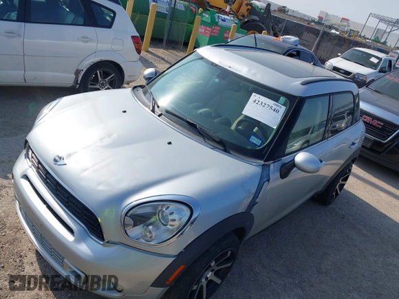 2013 MINI Countryman S z VIN WMWZC3C59DWP22638, wystawiony jako IAAI lot #42327540 z przebiegiem 155 060 mil mil oraz . Historia ofert i sprzedaży dostępna na DreamBid. Obrazek 6.