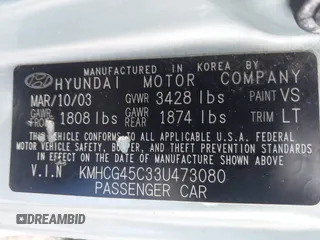 2003 Hyundai Accent GL with VIN KMHCG45C33U473080, listed as a IAAI auction lot 41868765 with 57,478 mi miles. Bid and sale history available at carsss.com. Image 9.
