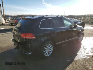 2016 Volkswagen Touareg Sport z VIN WVGEP9BP3GD004865, wystawiony jako Copart lot #87610915 z przebiegiem Nie podano mil oraz Szkoda całkowita • Salvage title. Historia ofert i sprzedaży dostępna na DreamBid. Obrazek 3.