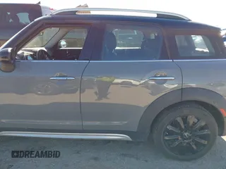 2019 MINI Countryman Cooper S z VIN WMZYT5C54K3G94548, wystawiony jako IAAI lot #42210212 z przebiegiem 82 505 mil mil oraz . Historia ofert i sprzedaży dostępna na DreamBid. Obrazek 14.