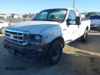 2002 Ford Super Duty F-250 XL with VIN 1FTNF20L72EB79640, listed as a IAAI auction lot 41667865 with 153,384 mi miles. Bid and sale history available at carsss.com. Image 2.