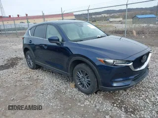 2019 Mazda CX-5 Touring with VIN JM3KFBCM5K0689948, listed as a IAAI auction lot 41976266 with 74,812 mi miles. Bid and sale history available at carsss.com. Image 1.
