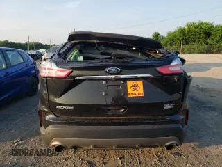2020 Ford Edge SEL с VIN 2FMPK4J90LBB57040, выставлен на аукционе Copart как лот 62237005 с пробегом Не указан миль и Списание • Salvage title. История ставок и продаж доступна на DreamBid. Изображение 6.