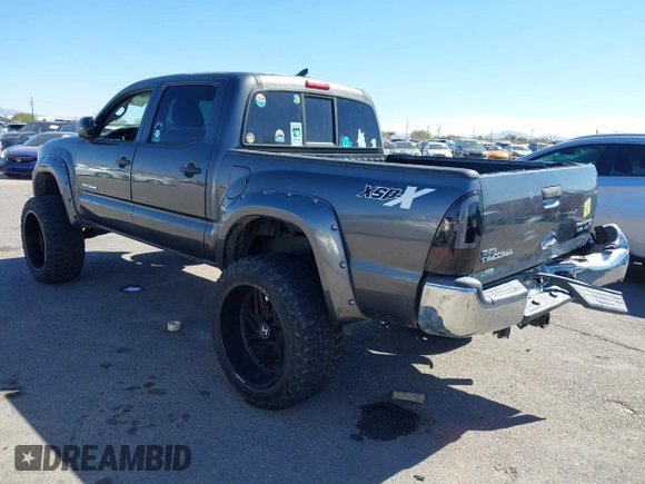 2014 Toyota Tacoma PreRunner with VIN 3TMJU4GN3EM165840, listed as a IAAI auction lot 41666871 with 150,333 mi miles and . Bid and sale history available at DreamBid. Image 3.