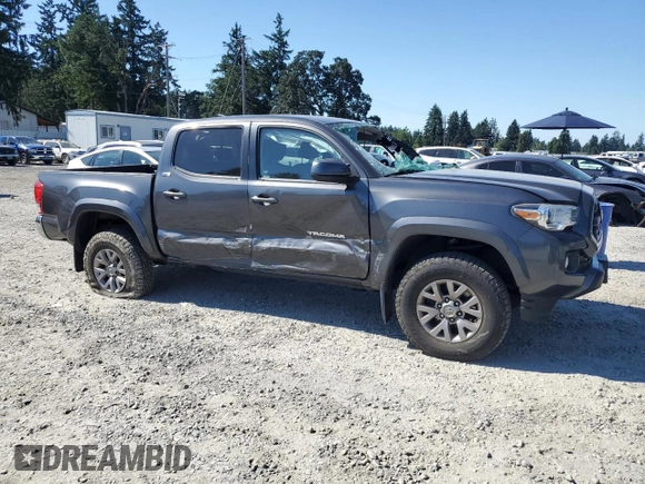 2017 Toyota Tacoma SR5 with VIN 3TMCZ5ANXHM052092, listed as a Copart auction lot 64898135 with 95,743 mi miles and Salvage title. Bid and sale history available at DreamBid. Image 4.