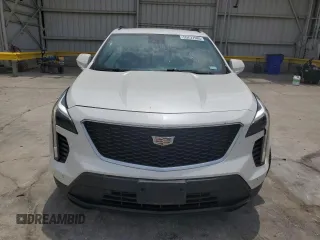 2020 Cadillac XT4 FWD Sport with VIN 1GYFZER49LF123830, listed as a Copart auction lot 55737985 with 98,871 mi miles and Salvage title. Bid and sale history available at DreamBid. Image 5.