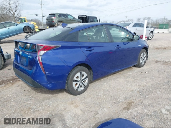 2018 Toyota Prius Two with VIN JTDKARFU3J3547008, listed as a IAAI auction lot 41804861 with 125,946 mi miles. Bid and sale history available at carsss.com. Image 4.