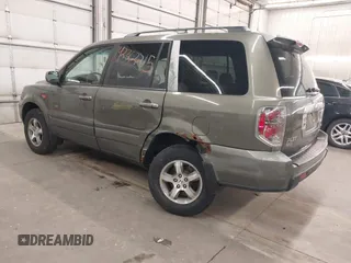 2007 Honda Pilot EX-L z VIN 2HKYF185X7H505077, wystawiony jako IAAI lot #42362215 z przebiegiem 174 592 mil mil oraz . Historia ofert i sprzedaży dostępna na DreamBid. Obrazek 3.