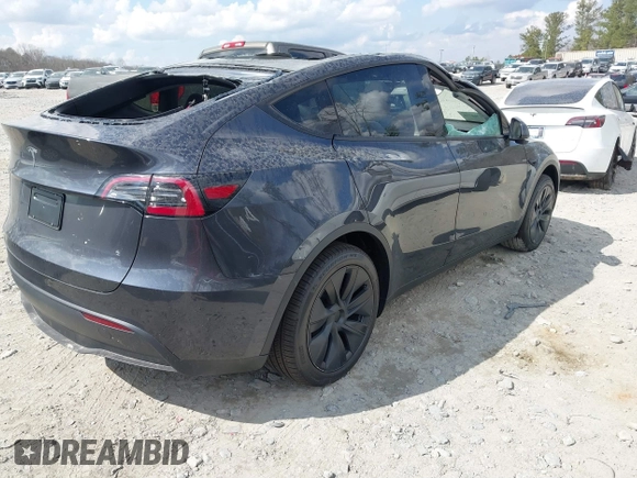 2025 Tesla Model Y Long Range with VIN 7SAYGDED3SA352138, listed as a IAAI auction lot 41760798 with 1,209 mi miles and . Bid and sale history available at DreamBid. Image 4.