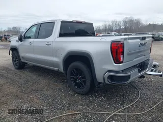 2022 GMC Sierra 1500 Limited Elevation with VIN 3GTU9CED7NG184649, listed as a IAAI auction lot 41453442 with 56,197 mi miles. Bid and sale history available at carsss.com. Image 3.