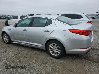 2012 Kia Optima LX z VIN 5XXGM4A73CG033597, wystawiony jako Copart lot #59585515 z przebiegiem 141 577 mil mil oraz Szkoda całkowita • Salvage title. Historia ofert i sprzedaży dostępna na DreamBid. Obrazek 2.