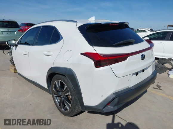 2021 Lexus UX with VIN JTHX3JBH5M2034944, listed as a IAAI auction lot 41068335 with 53,522 mi miles. Bid and sale history available at carsss.com. Image 3.