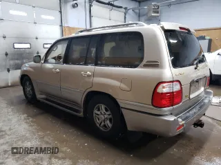 2001 Lexus LX 470 z VIN JTJHT00W213507042, wystawiony jako Copart lot #84236804 z przebiegiem 179 706 mil mil oraz Tytuł czysty. Historia ofert i sprzedaży dostępna na DreamBid. Obrazek 2.