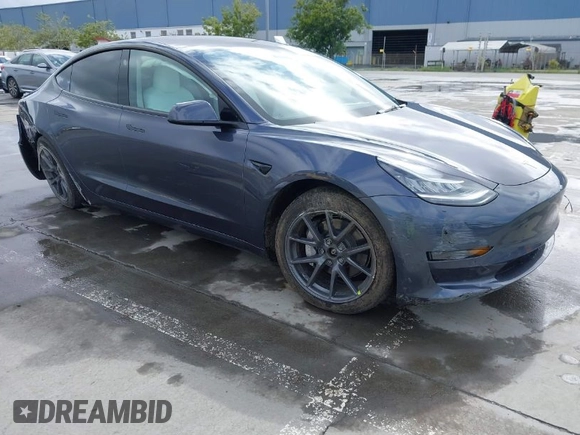 2022 Tesla Model 3 Long Range with VIN 5YJ3E1EB0NF259904, listed as a IAAI auction lot 41826642 with 42,272 mi miles and . Bid and sale history available at DreamBid. Image 1.