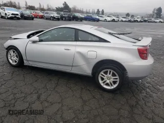 2003 Toyota Celica GT with VIN JTDDR32T530166373, listed as a Copart auction lot 85332084 with 0 mi miles and Salvage Title. Bid and sale history available at carsss.com. Image 2.