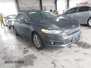 2015 Ford Fusion Energi Titanium with VIN 3FA6P0SU0FR253548, listed as a IAAI auction lot 41493710 with 172,417 mi miles. Bid and sale history available at carsss.com. Image 1.