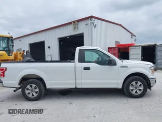 2019 Ford F-150 XL z VIN 1FTMF1C51KKC79270, wystawiony jako IAAI lot #42337543 z przebiegiem 146 916 mil mil oraz . Historia ofert i sprzedaży dostępna na DreamBid. Obrazek 13.