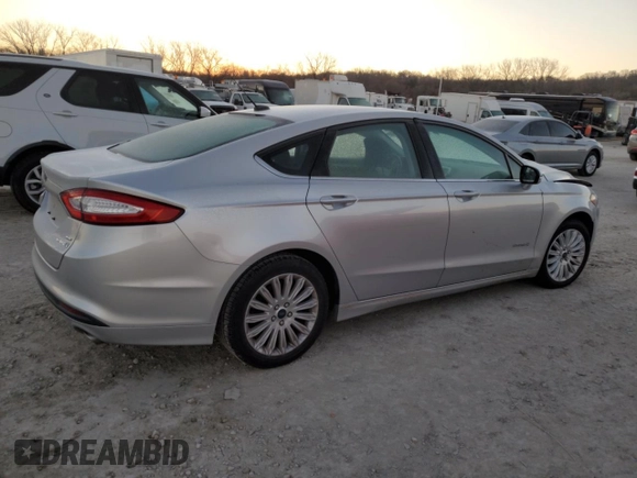 2015 Ford Fusion SE Hybrid with VIN 3FA6P0LU5FR199498, listed as a Copart auction lot 84020974 with 0 mi miles and Salvage Title. Bid and sale history available at carsss.com. Image 3.