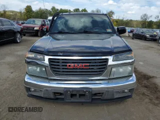 2011 GMC Canyon SLE1 with VIN 1GTH6MFE8B8102114, listed as a Copart auction lot 74137234 with 150,598 mi miles and Salvage Title. Bid and sale history available at carsss.com. Image 5.